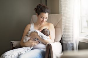 Woman Breastfeeding Infant